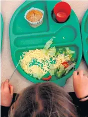  ??  ?? Budgets: Schools have been told they will have to pay for hot meals for pupils