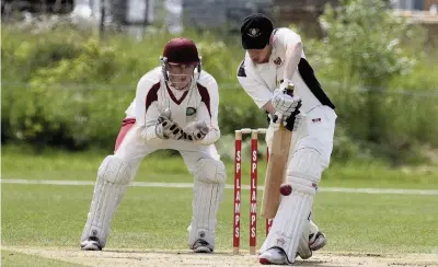  ??  ?? Jack Rimmington batting for Llandudno with Mochdre’s James French behind the stumps.