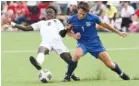  ?? STAFF PHOTO BY ROBIN RUDD ?? Boyd Buchanan's Mills Wood (1) collides with Franklin Grace's Zion Jones (8) on May 26. Boyd Buchanan met Franklin Grace in the championsh­ip match of the Division II Class A in TSSAA's Spring Fling at the Siegel Soccer Complex.