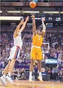  ?? DARRYL WEBB/ASSOCIATED PRESS ?? Tennessee’s Admiral Schofield (5) puts up a go-ahead shot against Gonzaga’s Brandon Clarke during the second half of the Volunteers’ 76-73 win on Sunday.