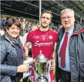  ?? PHOTO: SPORTSFILE ?? Good sports: Pat McDonagh and his wife Una with Galway captain David Burke after the Allianz Hurling League Division 1 Final match in 2017.