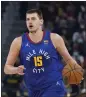  ?? JEFF CHIU — AP ?? Nuggets center Nikola Jokic was chosen the NBA's MVP on Monday for the second straight season.