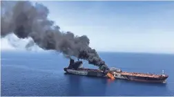  ?? AP/ISNA ?? Two oil tankers near the strategic Strait of Hormuz were hit on Thursday, an assault that left one ablaze and adrift.