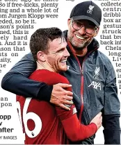  ??  ?? Big hugs: Klopp and Andrew Robertson after the win GETTY IMAGES