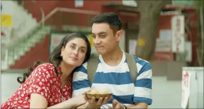  ?? PHOTOS BY PARAMOUNT ?? Kareena Kapoor, left, and Aamir Khan in “Laal Singh Chaddha,” which will be released in theaters around the world.