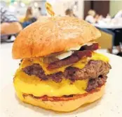  ?? ?? Our server opined that the Stack Burger was the best burger in Disney World. I haven’t had ‘em all, but he might be right. This double-patty smash burger was pretty smashing.