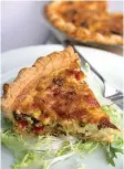  ?? Tribune News Service ?? ■ Ham, Leek and Mushroom Quiche is enlivened by chopped red pepper and Dijon mustard.