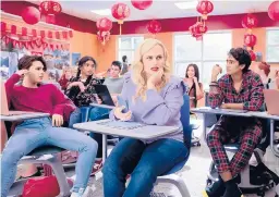  ?? NETFLIX ?? Rebel Wilson, center, stars as Stephanie Conway in “Senior Year.”