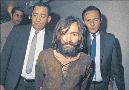  ??  ?? Charles Manson is taken to court in Los Angeles after 1969 murders