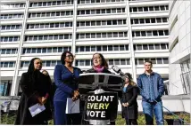  ?? HYOSUB SHIN / HSHIN@AJC.COM ?? Lauren Groh-Wargo, CEO of Fair Fight Action and Stacey Abrams’ campaign manager, discusses a voting lawsuit Tuesday at Richard B. Russell Federal Building in Atlanta.