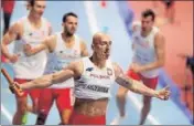  ?? REUTERS ?? Jakub Krzewina of Poland celebrates winning the relay.