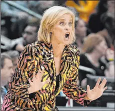  ?? Darron Cummings The Associated Press ?? Louisiana State coach Kim Mulkey put part of the blame on a brawl between players from her team and South Carolina on the officials.