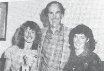  ??  ?? Neerim South A Grade coach Harry Wood stands alongside Jenny Muir (left) and best and fairest winner Vicky Ballantyne after another winning year for Neerim South.