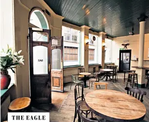  ??  ?? THE EAGLE HAS EXPANDED Tables are spaced out to adhere to social distancing requiremen­ts and the upstairs gallery space now hosts diners, who can enjoy dishes such as the soup, below
