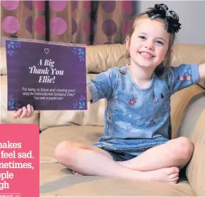  ??  ?? INSPIRATIO­NAL Ellie with certificat­e for sharing her epilepsy story