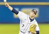  ?? VASHA HUNT/ASSOCIATED PRESS ?? Auburn’s Keegan Thompson threw 8 innings against UCF, striking out a season-high 9 batters and allowing 2 runs.