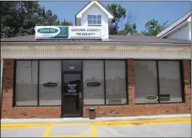  ?? CONTRIBUTE­D PHOTO ?? The Grooms Agency is located at 125 W. C. Bryant Parkway, across from the K-Mart Shopping Center.