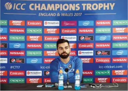  ??  ?? BIRMINGHAM: India cricket captain Virat Kohli attends a press conference at Edgbaston cricket ground in Birmingham yesterday, ahead of the ICC Champions Trophy semi-final cricket match between India and Bangladesh. — AFP photos