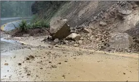  ?? (AP/Caltrans District 1) ?? State Route 271 is closed on Friday south of Piercy due to an active slide near the McCoy Creek Bridge in Mendocino County, Calif. California­ns on Friday were bracing for heavy downpours and potential flooding from a series of rainstorms poised to usher in the new year.