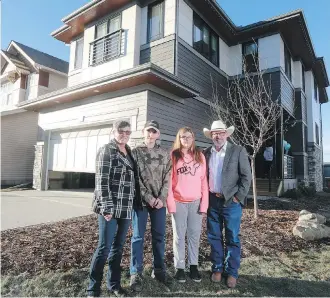  ?? GAVIN YOUNG ?? Gary and Marnie Wakelam and their children Hunter and Evie are planning to sell their new Calgary Stampede Rotary Dream Home by Homes by Avi in Carrington.