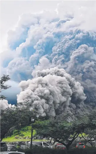  ??  ?? This picture taken from the Instagram account of @rochilazot­v shows Guatemala’s Volcano of Fire during an eruption in Alotenango, Guatemala, on June 3. The death toll from the eruption has risen to at least 65 with many of the victims from farming...
