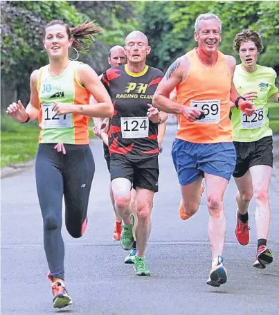  ??  ?? Carnegie’s Jo Murphy, left, was first female at the latest Create & Prosper Beveridge Park 5km race in Kirkcaldy. She is seen alongside Martin McNellis of PH Racing, Fife AC’s Jimmy McIntyre, and Colin McKie of Anster Haddies).