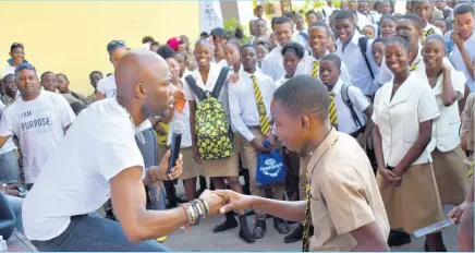  ??  ?? Rondell Positive during his performanc­e at Charlie Smith High School.