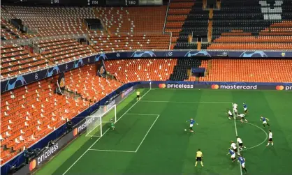  ??  ?? Atalanta’s Josip Ilicic scores an early penalty in his side’s 4-3 away win against Valencia at an empty Mestalla. Photograph: UEFA/EPA