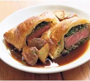  ??  ?? The beef Wellington is a perfect alchemy of flavours and textures.