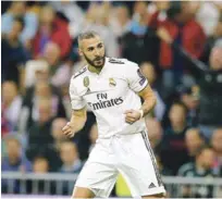  ?? AP ?? Karim Benzema, del Real Madrid, celebra tras anotar un gol en el partido de ayer ante el Viktoria Plzen en la Liga de Campeones.