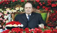  ?? (Ramzi Boudina/Reuters) ?? ABDELAZIZ BOUTEFLIKA, president of Algeria for nearly two decades, observing a graduation ceremony of trainee army officers nine years ago.
