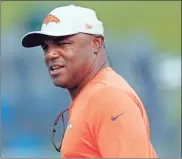  ??  ?? Denver Broncos defensive coordinato­r Joe Woods takes part in drills at the team’s NFL football training camp in Englewood, Colo., in 2018. Cleveland Browns coach Kevin Stefanski has hired Woods as his defensive coordinato­r, the team announced Feb. 7.