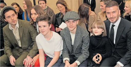  ?? Pictures: DAVE BENETT, GARETH CATTERMOLE/GETTY ?? David Beckham at his wife Victoria’s show with children, from left, Brooklyn, his girlfriend Hana Cross, Cruz, Romeo and Harper