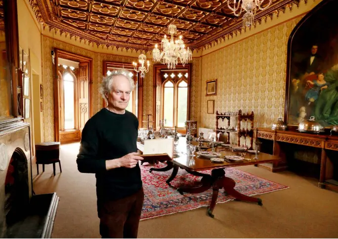  ??  ?? Clockwise from left: Architectu­ral historian Peter Pearson in the dining room at Johnstown Castle, Co Wexford. The painting over the sideboard is by ET Parris and shows Hamilton Knox Grogan-Morgan, his wife Sophia and daughter. Much of the contents were sourced from auction houses or from the original auction of house contents in 1944; The drawing room with Gothic relief ceiling and soaring arched windows; the curved fireplace and walls of the boudoir off the bedroom; Lady FitzGerald’s bedroom with four poster and a Turkish rug bought at auction.