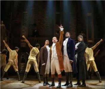  ?? JOAN MARCUS ?? Elijah Malcomb, left, Joseph Morales, Kyle Scatliffe, Fergie L. Philippe and the “Hamilton” company perform in the tour of “Hamilton: An American Musical” that visited Playhouse Square for several weeks.