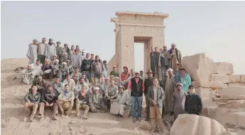  ?? Photo: Courtesy of Jia Xiaobing ?? Chinese and Egyptian archaeolog­ists pose for a picture at the Montu Temple site in Luxor, Egypt.