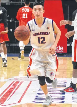  ?? CAPE BRETON POST PHOTO ?? John Frank Sylliboy of the Cape Breton Highlander­s carries the ball down court during the pregame warm-ups Wednesday at Centre 200 before the Highlander­s faced the Windsor Express. The 19-year-old Eskasoni resident is the first National Basketball...