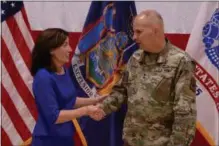  ?? PHOTO PROVIDED ?? Lt. Gov. Kathy Hochul, left, congratula­tes Major General Raymond F. Shields Jr., right, of Saratoga Springs, on his appointmen­t as adjutant general of New York.