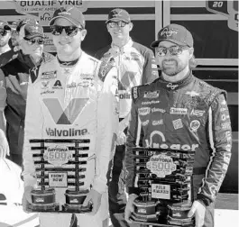 ?? TERRY RENNA/AP ?? Alex Bowman, front left, and Ricky Stenhouse Jr. hold their trophies after securing the top two starting positions in the Daytona 500 during qualifying at Daytona Internatio­nal Speedway Sunday.