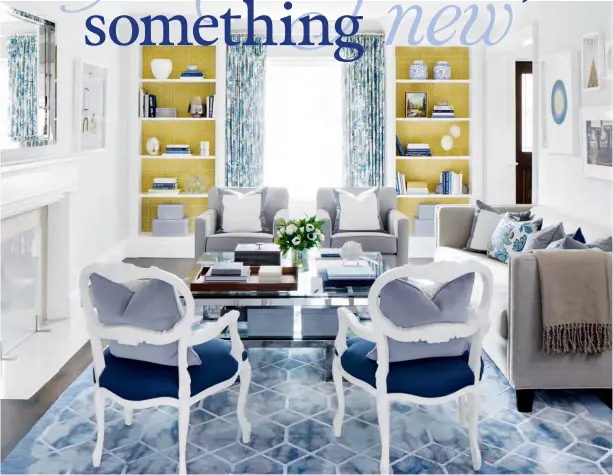  ??  ?? ABOVE The pair of vintage armchairs in the living room came from homeowners Lesley and Robert Cancelli’s previous house, but designer Stephanie Lees had their frames painted a pale grey and their seat cushions upholstere­d in a rich blue linen. Yellow...