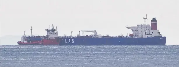  ?? REUTERS ?? The seized Russian-flagged oil tanker Pegas is seen anchored off Karystos, on the Greek island of Evia last April.