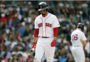  ?? WINSLOW TOWNSON — THE ASSOCIATED PRESS ?? Boston Red Sox’s Mookie Betts heads back to the dugout after striking out during the ninth inning of a loss to the Tampa Bay Rays in a baseball game Sunday in Boston.