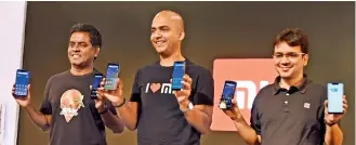  ??  ?? From left: Xiaomi Sri Lanka Country General Manager Vidya Mugada, Xiaomi India Managing Director and Vice President Xiaomi Global Manu Jain and Xiaomi India Overseas Expansion Indian subcontine­nt Head Sanket Agarwal launch the new MI phonesPIC BY KITHSIRI DE MEL