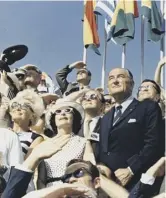  ??  ?? Clockwise from main: Buzz Aldrin walks on the Moon; Apollo 11 is launched; vicepresid­ent Spiro Agnew and ex-president Lyndon Johnson view the lift-off in Florida