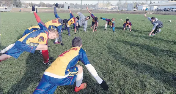  ?? BRYAN SCHLOSSER ?? Members of the Sheldon-Williams Spartans boys soccer team, who hail from seven countries, say teamwork, not technical skills, is the key to a successful season.