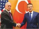  ?? Reuters ?? Jim Mattis with Nurettin Canikli during a meeting at Nato headquarte­rs in Brussels on Wednesday.