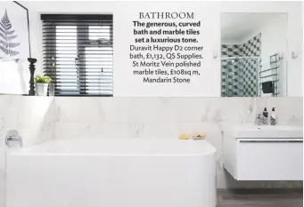  ??  ?? Bathroom The generous, curved bath and marble tiles set a luxurious tone. duravit Happy d2 corner bath, £1,132, Qs supplies. st moritz Vein polished marble tiles, £108sq m, mandarin stone master Bedroom Katey’s grey theme continues here with shades...
