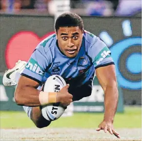  ?? Photo: Fairfax NZ ?? Michael Jennings in tryscoring form for New South Wales.