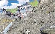  ?? PTI FILE ?? An oil tanker got stuck under debris of boulders following a ■ landslide on the Manali-Leh highway on Tuesday.