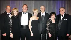  ?? (NWA Democrat-Gazette file photo/Carin Schoppmeye­r) ?? Mark and Sara Moses (from left), Tony and Mary Beth Sherman, Pete and Shirley Esch and Kent Whillock help support Mercy Health Foundation at a previous O Night Divine Charity Ball. The family was honored as the foundation’s Outstandin­g Philanthro­pic Family of the Year at that fundraiser.